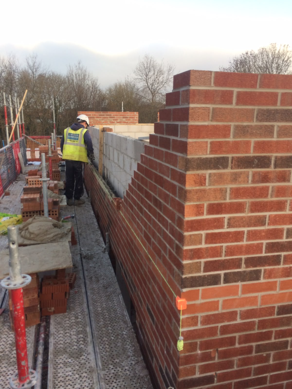 Bricklayer at work on site